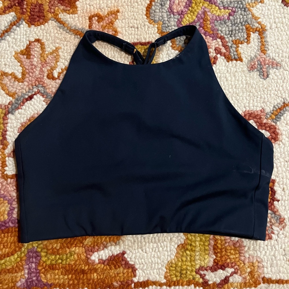 Small previously loved blue exercise bra from Girlfriend Collective